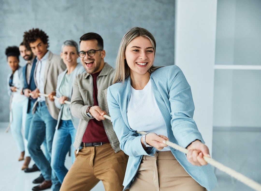 Medarbejderudvikling illustreret med tovtrækning